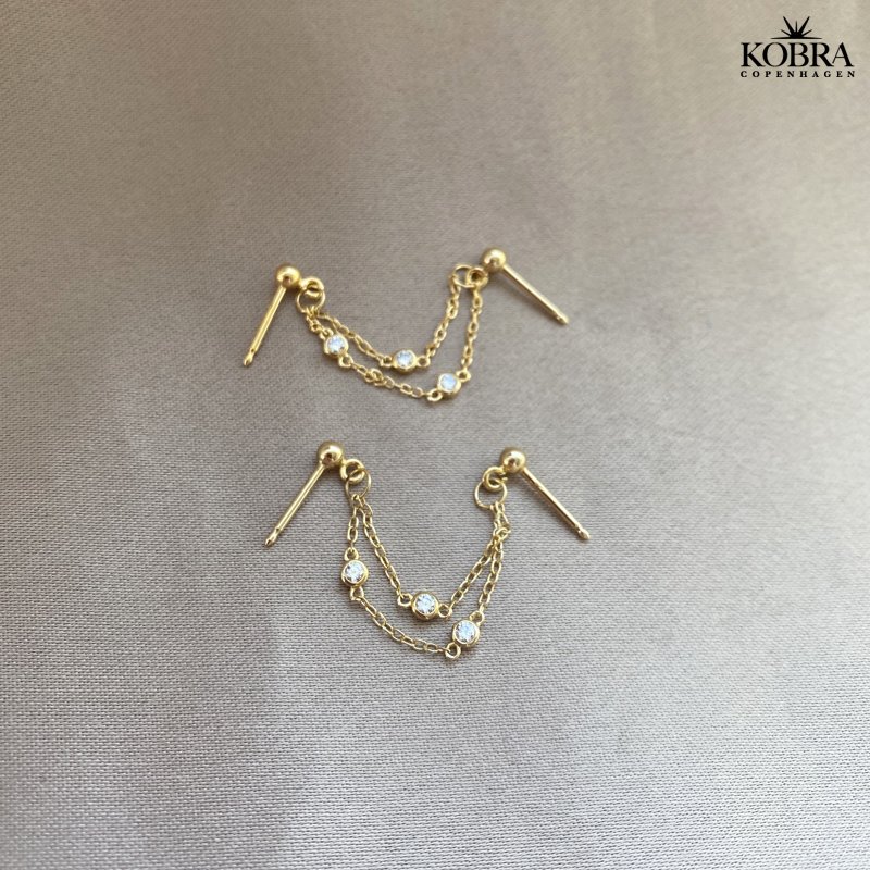 "Vilja" Forgyldte reringe med sten til 2 huller i rerne