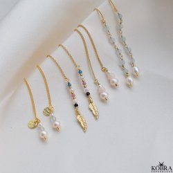 "Miu" 18 karat forgyldte reringe med perler, sten og fjer