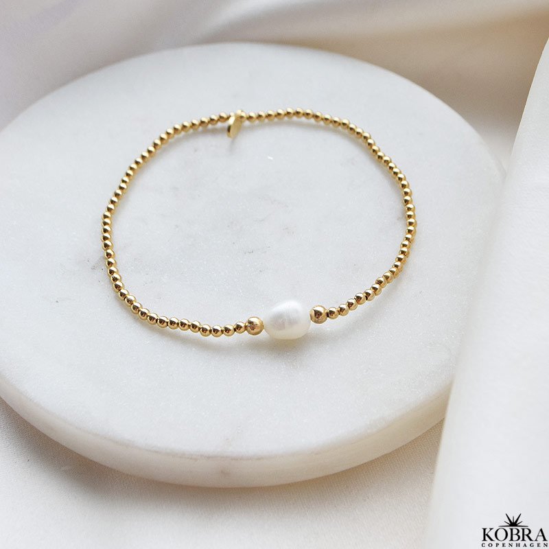 "Dixie" gold-plated bracelet with gold balls and freshwater pearl