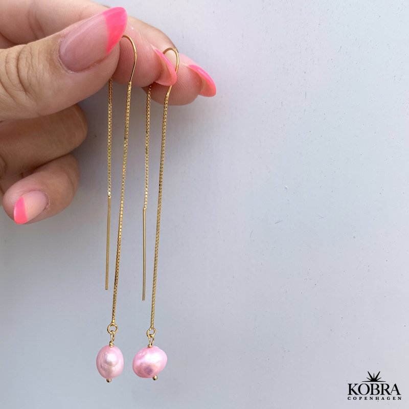 "Pina" guld reringe med lyserde perler 