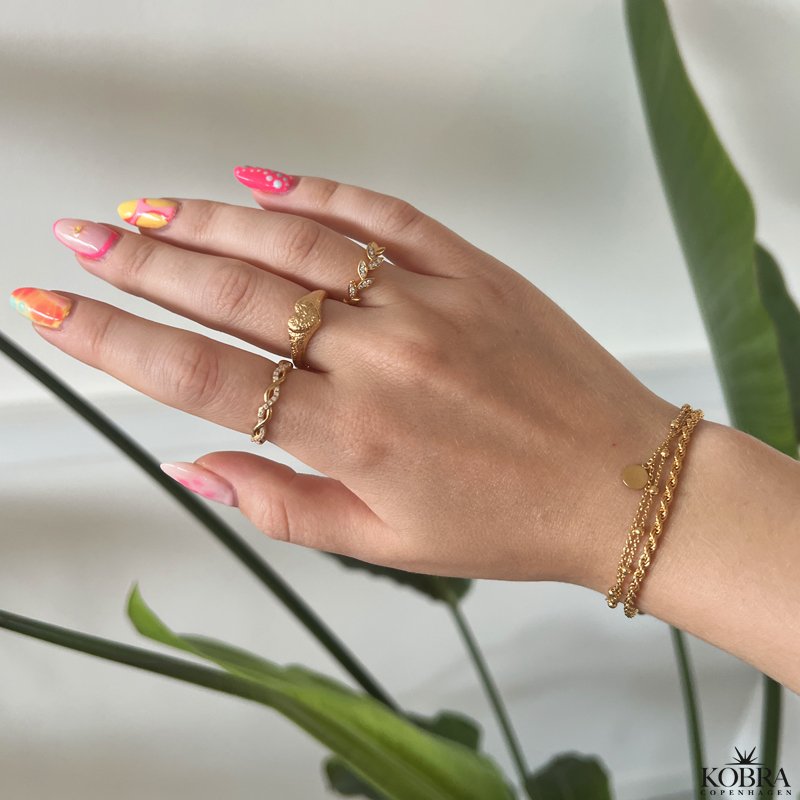 "Emma" flettet ring i gull