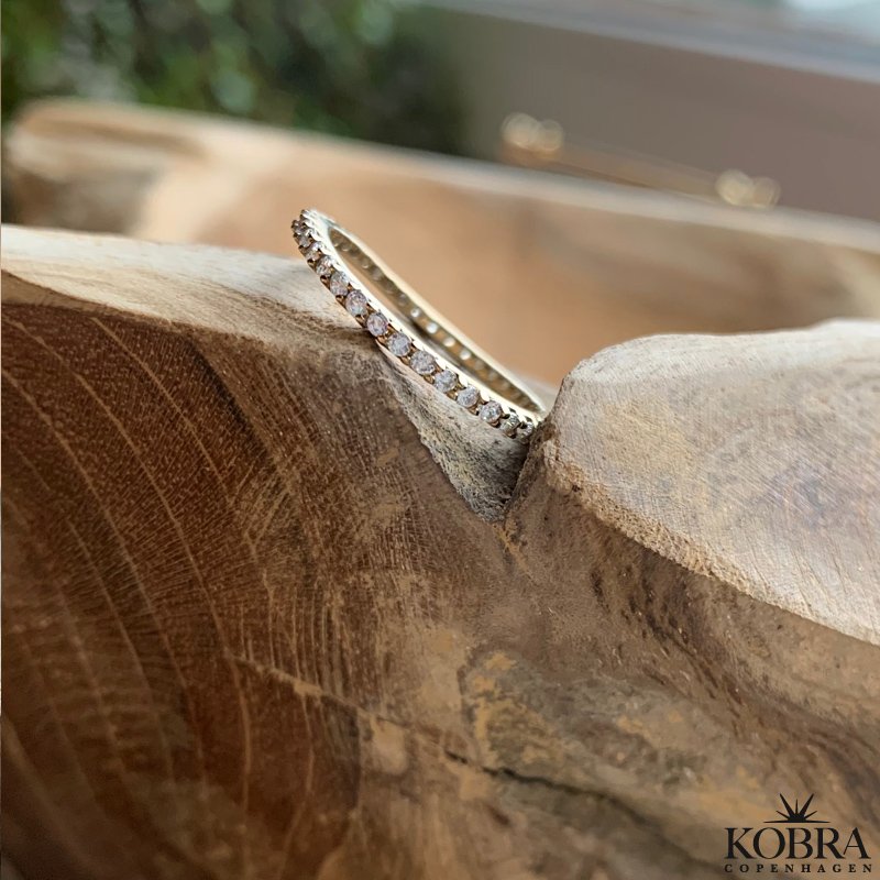 "Hawaii" 18 carat gold plated ring with white stones