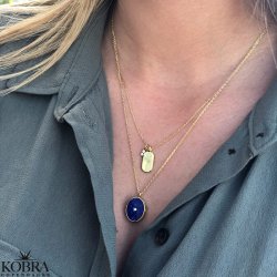 "Twinkle" guld halskde med stjerne og charm