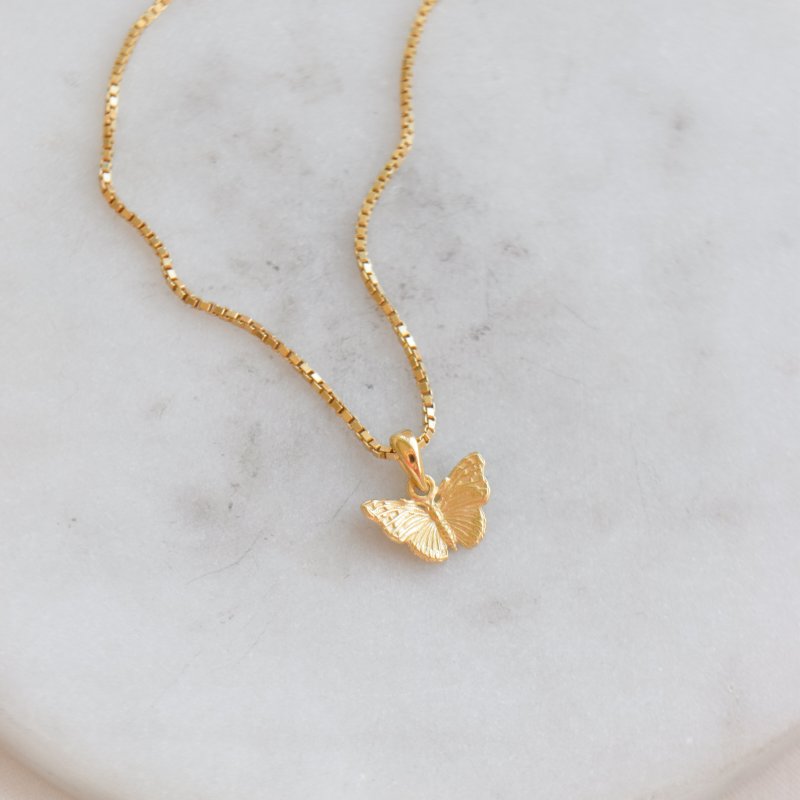 "Luma" Charm - gull sommerfugl