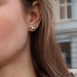 "Solenne" wavy guld reringe med sten