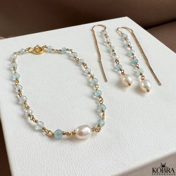 "Ellish" guld armbnd med bl aquamariner samt hvid ferskvandsperle