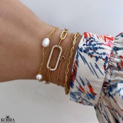 "Trouble" chunky chain with oval center piece with stones in gold