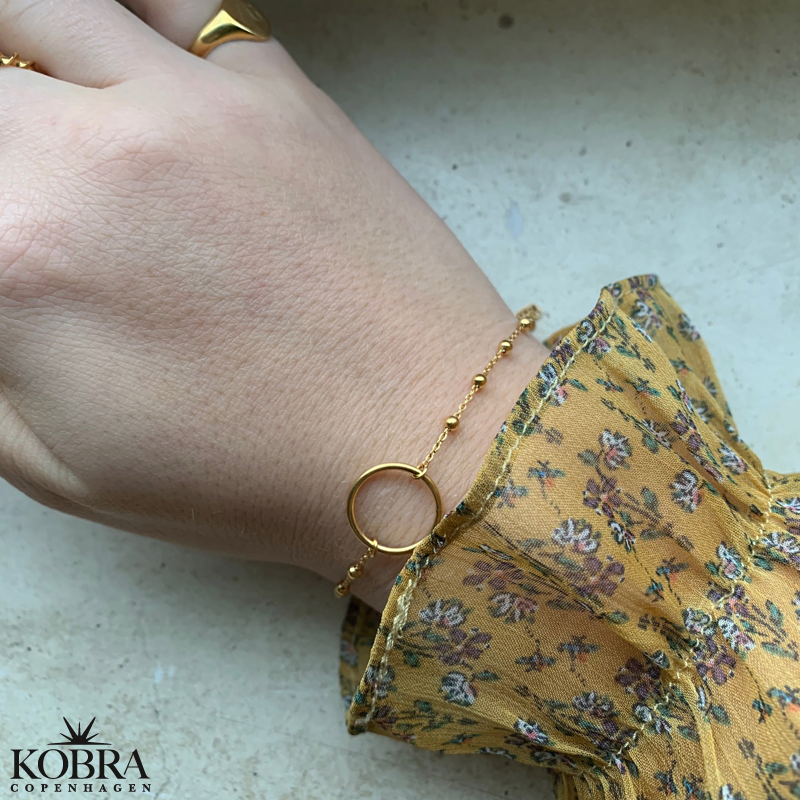 "Carol" 18 carat bracelet with gold ring and ball chain