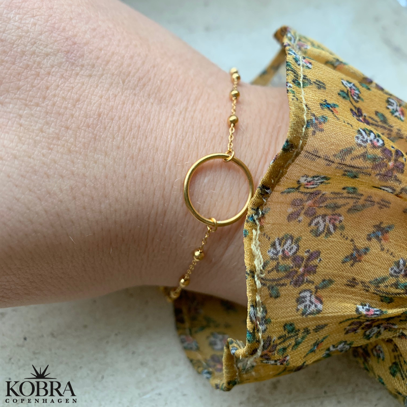 "Carol" 18 carat bracelet with gold ring and ball chain