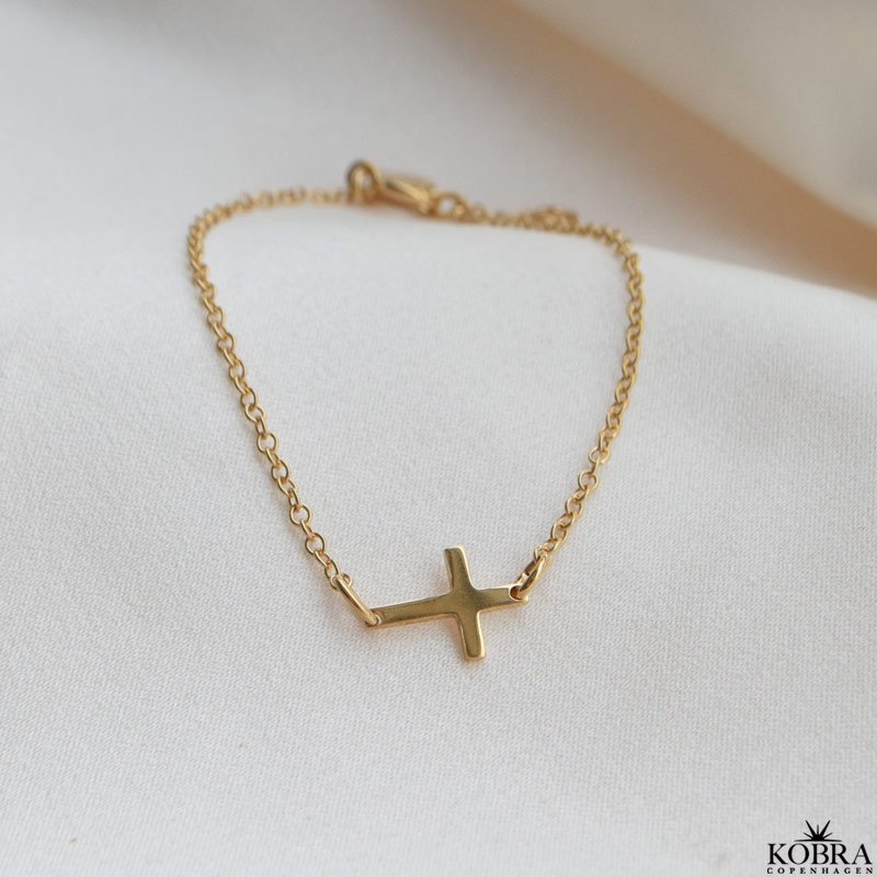 "Trust" 18 carat gold plated cross bracelet