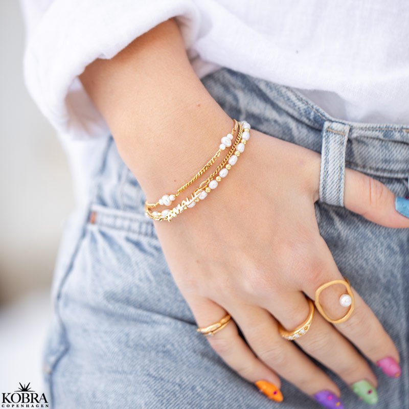 "Midsommar" perlearmbnd i forgyldt med panzerkde