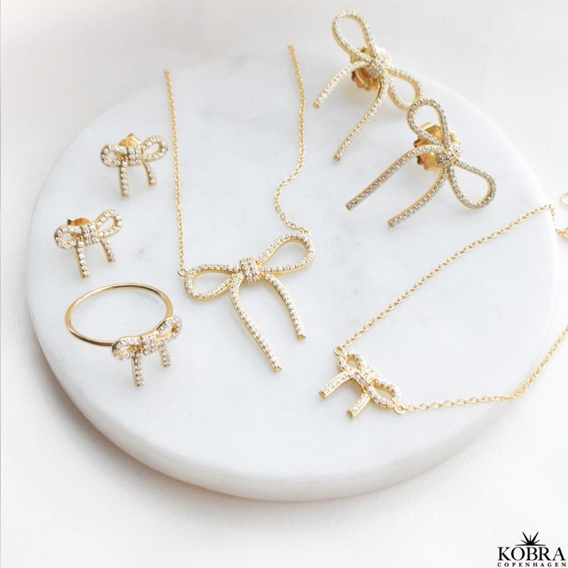 "Leonora" 18 carat gold-plated bow bracelet with white zirconia