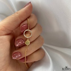 "Polo" guld armbnd med lille cirkel og hvide sten