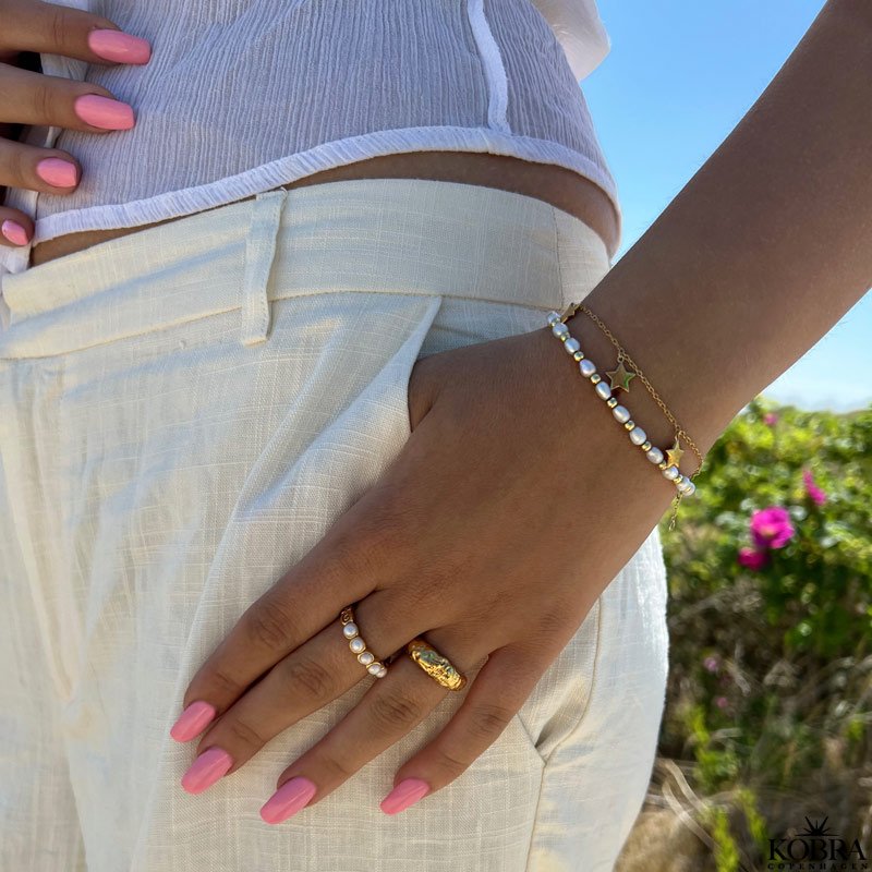  "Mina" bracelet with star pendants in gold