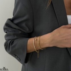 "Ivy" tennis armbnd i guld