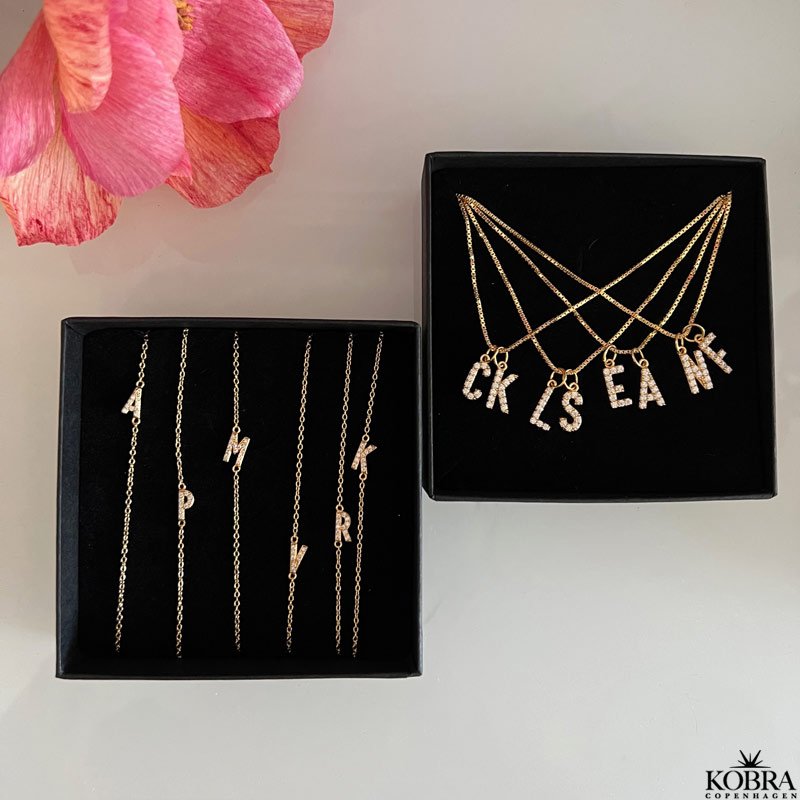 "Alias" gold necklace with your letter