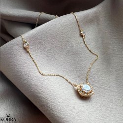 "Sylvie" guld halskde med hvide zirkonia sten