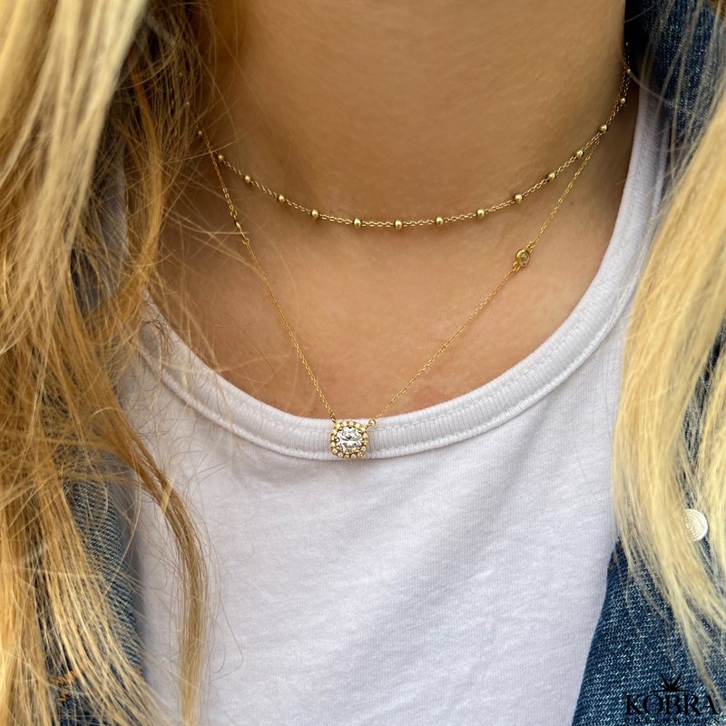 "Sylvie" guld halskde med hvide zirkonia sten