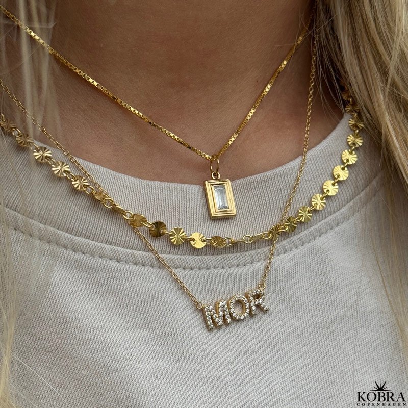 "SOL" gold necklace with small suns