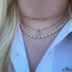 "Alias" gold necklace with your letter