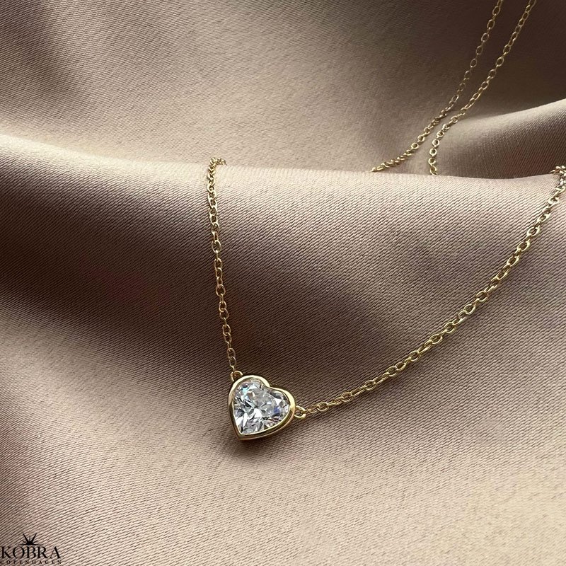 "Junie" gold heart necklace with heart zirconia stones