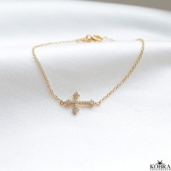 "Runa" gold cross bracelet with white zirconia stone