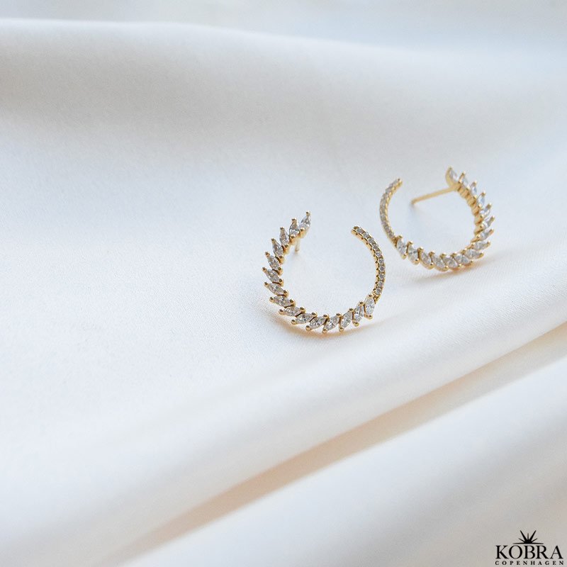 "Gabriella" gold earrings with round and oval white stones