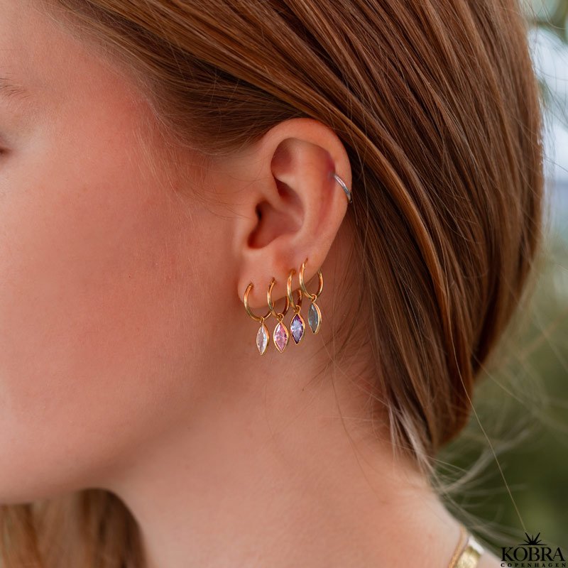 "Lyra" sm guld hoops med pink glassten