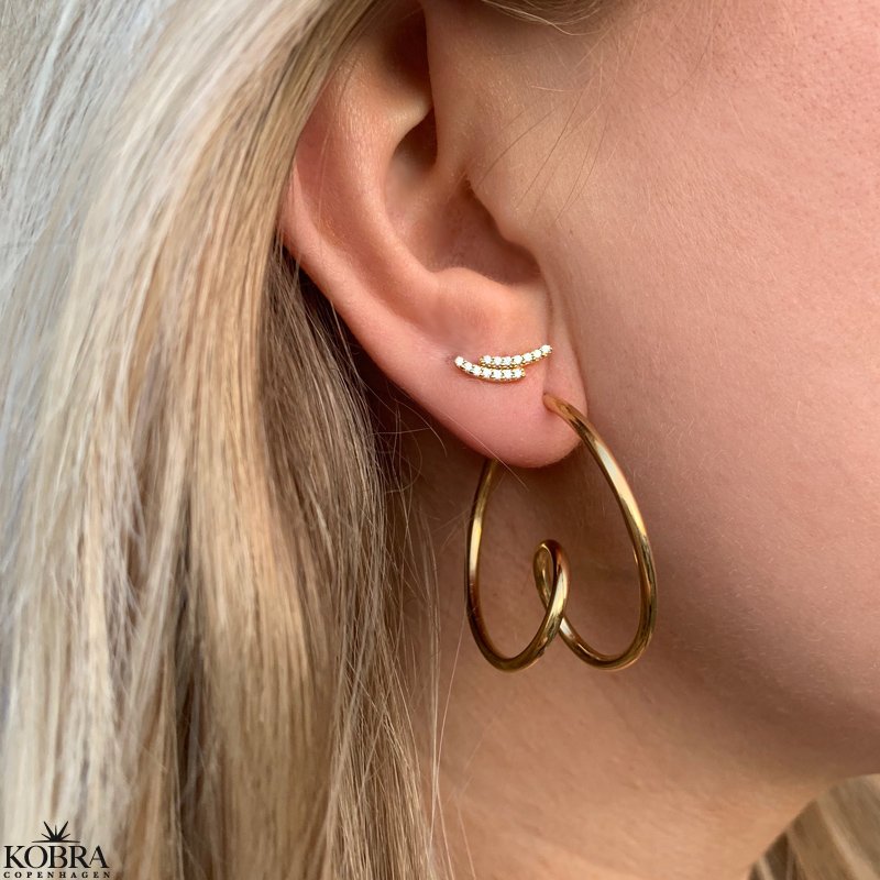 "Stormy" guld reringe med hvide zirkonia sten