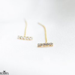 "Brilliant" guld retrde med hvide sten