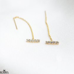 "Brilliant" guld retrde med hvide sten