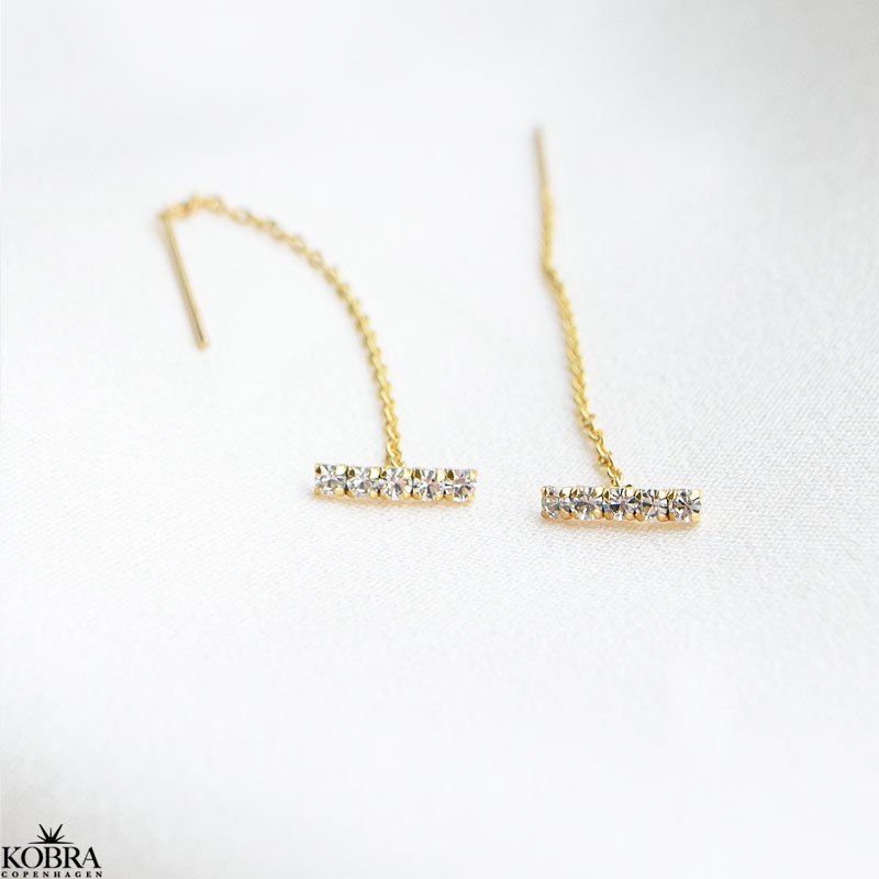 "Brilliant" guld retrde med hvide sten