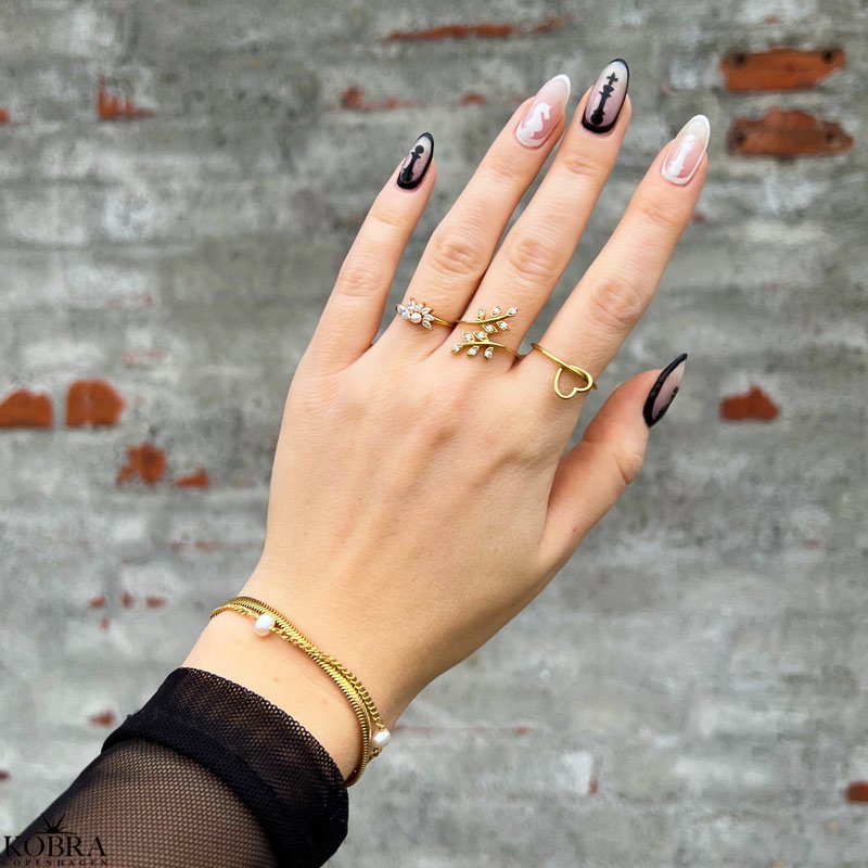 "Helena" guld - fidget -  ring med "lst" hjerte