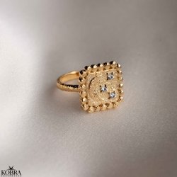 "Moondust" gold ring with moons and stars