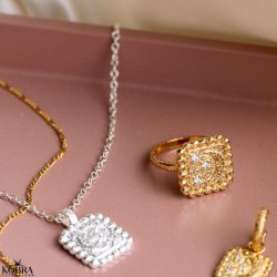 "Moondust" gold ring with moons and stars