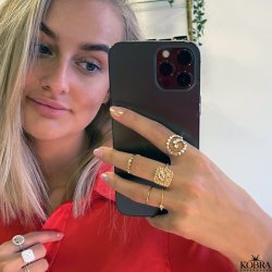 "Moondust" gold ring with moons and stars