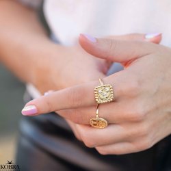 "Moondust" gold ring with moons and stars