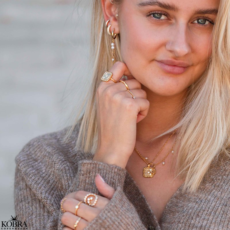 "Moondust" gold ring with moons and stars