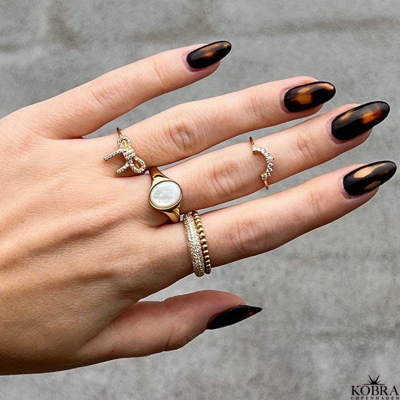 "Alexis" gilded ring with white stones