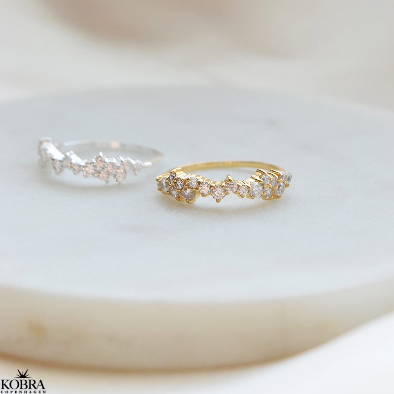 "Mikami" 18 carat gold plated ring with white stones