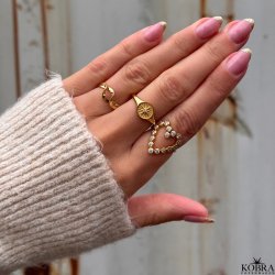 "Cassiopeia" gold signed ring with star and white stone