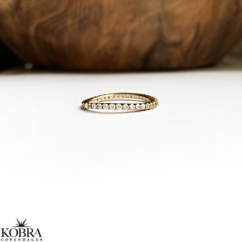 "Hawaii" 18 carat gold plated ring with white stones