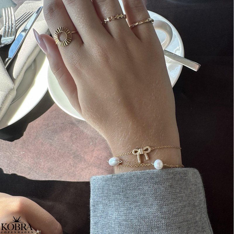 "LaBelle" perle armbnd med guldkder