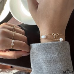 "Leonora" 18 carat gold-plated bow bracelet with white zirconia