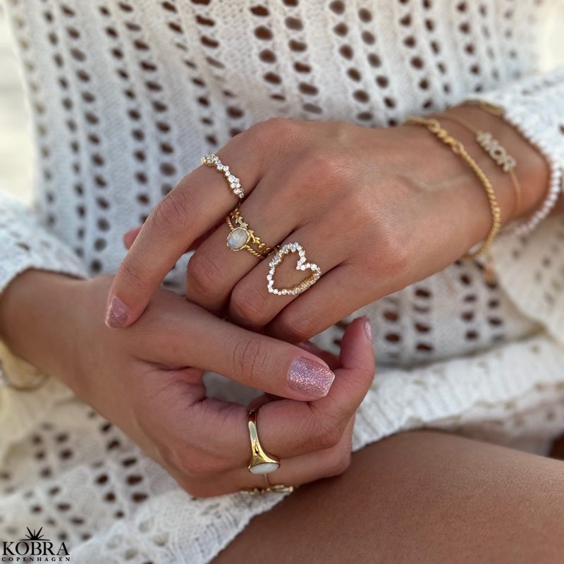 "Mikami" 18 carat gold plated ring with white stones