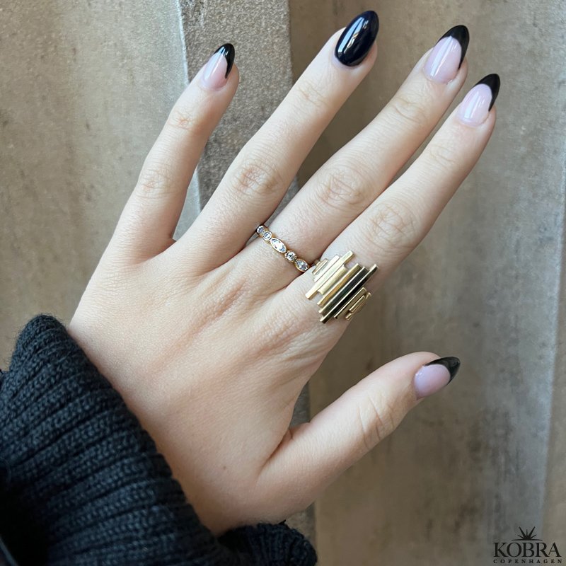 "Firenze" 18 karat forgyldt ring med hvide sten