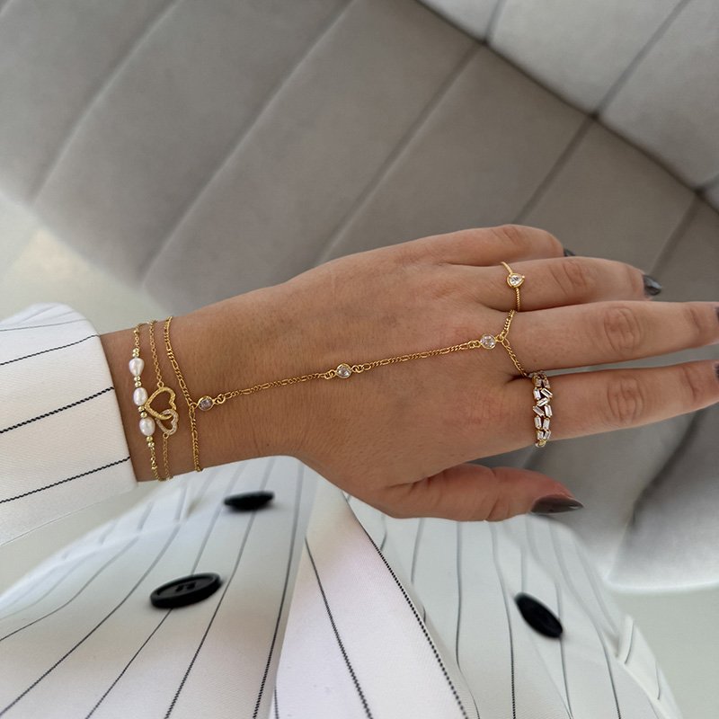 "Alessia" guld h�ndk�de med hvide zirkonia