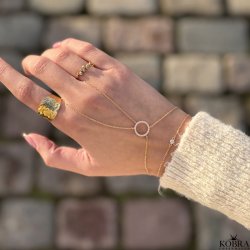 "Rising Sun" gold bracelet and ring