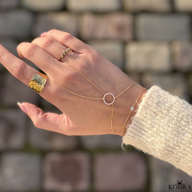 "Rising Sun" gold bracelet and ring