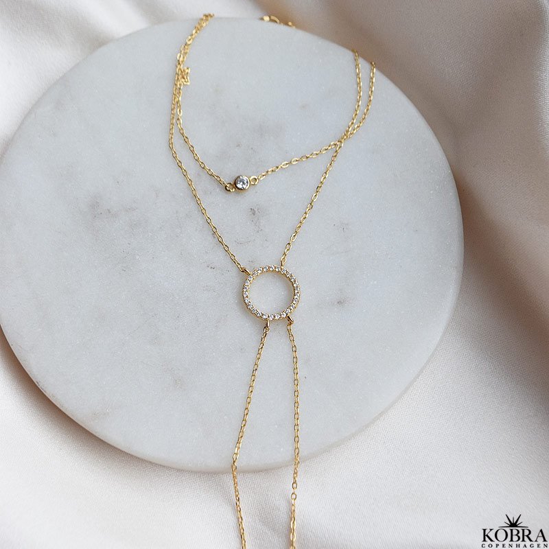 "Rising Sun" gold bracelet and ring